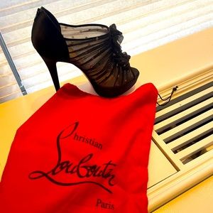 Christian Louboutin high heels.